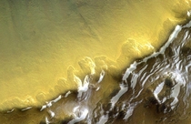 Image of the TGO device of the Russian-European ExoMars  mission captures the South-Eastern wall of the -kilometer crater The photo shows eternal deposits of water ice
