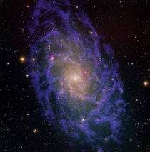 Image of the Triangulum Galaxy created by combining optical data from the -meter telescope on Kitt Peak in Arizona with radio data from the Very Large Array VLA telescope in New Mexico and the Westerbork Synthesis Radio Telescope WSRT in the Netherlands 
