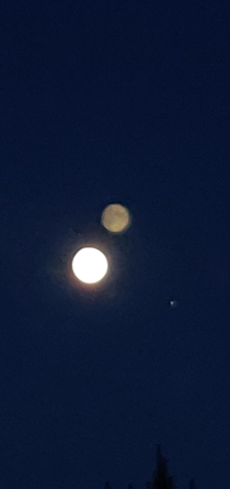 In Finland i can see jupiter next to the moon with only my phone camera Sorry for the window reflection of the moon