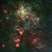 In this image captured by MPGESOs Wide Field Imager were able to see amazing detail and spider-like textures of the Tarantula Nebula located in the LMC There are so many stars and star clusters its almost overwhelming 