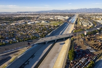 In   years after a catastrophic flood the LA River was paved in concrete Contrary to popular belief there was never any serious thought of using the channel as a freeway