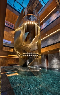 Indoor pool with fancy staircase in Singapore