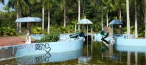 Ink black water in this abandoned toddlerpool in Vietnam