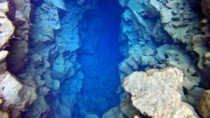 Into the blue - Glacial Rift between tectonic plates in Iceland 