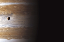 Io High Above Jupiters Storms 