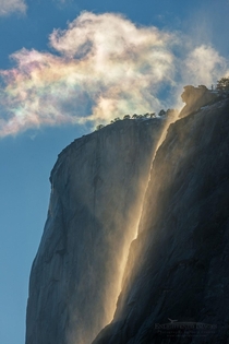Iridescence in clouds over El Capitan amp Horsetail Fall Yosemite National Park CA 