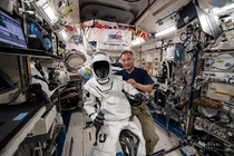 JAXA Astronaut Soichi Noguchi shows off his Crew Dragon spacesuit