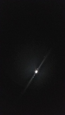 Jupiter and its four visible moons