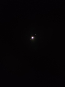 Jupiter and its moons taken through a spotting scope