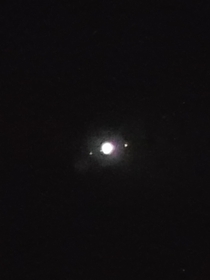Jupiter as seen on my s through binoculars Ya it aint much to look at but Im surprised to be able to see the moons clearly at all