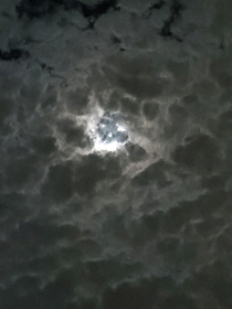 Just the clouds and the moon peeking