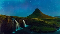 Kirkjufellfoss on a starry night plus northern lights Kirkjufell Iceland 