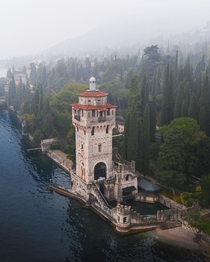La Torre di San Marco a tower built as an observatory for a German industrialist Richard Langensiepen in the early s and now used as a wedding venue on the shores of Lake Garda Gardone Riviera Brescia Lombardy Italy