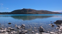 Lake Tekapo South Island of New Zealand The ground up glacial rock dust from its tributaries gives the water a beautiful pale translucent blue hue 