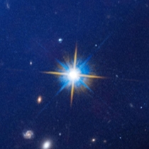 Lens flared stars around Gravitational Lenses are some of the coolest looking Celestial Objects You can find many of these on Hubbles site of you zoom in