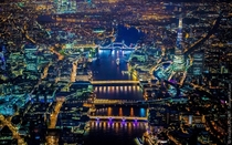 London at night along the Thames facing east with Canary Wharf in the distance Vincent Laforet