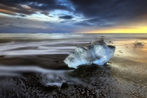 Lone ice on Jokulsarlon beach Iceland by Christian Lim