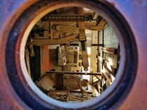 Looking Inside an abandoned overturned humvee