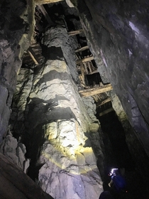 Looking up at working platforms in a stope within an abandoned silver mine from the early s