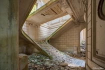Magical staircase in an abandoned french castle completely frozen in time 