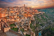 Matera Italy is the oldest city in Italy and is famous for the stone houses of the old town next to the revine
