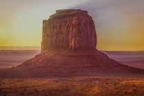 Merrick Butte in Monument Valley Az glowing pink from the desert sunrise Stunning loction 