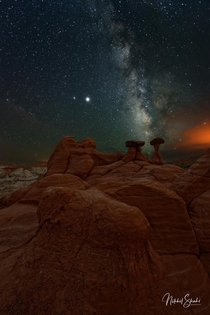Milky Way over Toadstool Hoodoos  Southern Utah  Mangum Fire to the Right  Nikon D  Nikon -mm   seconds  f  ISO 