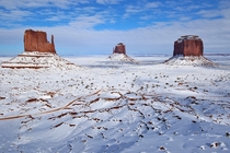 Monument valley after a snowfall   by John Fox