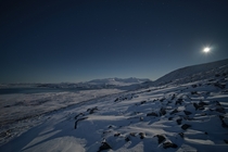 Moonlit winter landscape in Stugudalen Norway 