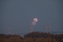 Moonrise  A composite image made from two images roughly  minutes apart of the full moon rising from Al Sadeem Observatory in Al Wathba Abu Dhabi 