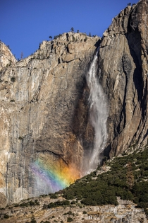 Morning rainbow in the mist of Yosemite Falls Yosemite CA 