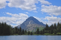 Mount Birdwood poking over a lake in Kananaskis AB Canada IG ScenicAlberta