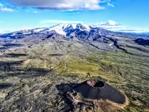 Mount Edziza extinct volcano in northern BC Canada No its not the small cone but the big one with the glacier The small cone is one of many around the base 