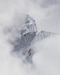 Mountain in the clouds Nepal  IGzachgibbonsphotography