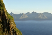 Mountains of Eysturoy viewed from the Kallur Lighthouse at Kalsoy - Faroe Islands 