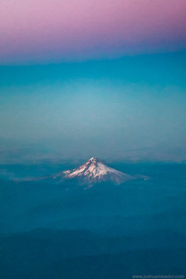 Mt Hood Oregon from an airplane window at sunset 