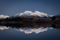 Mt Potts Reflecting on Lake Camp NZ 