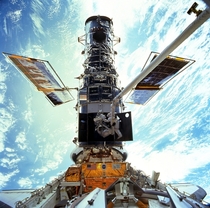NASA astronauts Steven Smith amp John Grunsfeld servicing the Hubble Space Telescope December  