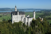 Neuschwanstein Schwangau Germany Designed by Ludwig II King of Bavaria The equivalent of  Million was not enough to finish it Have a look at the comments for details 