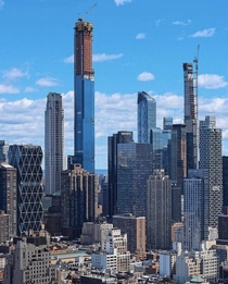 New York City shown here in the process of making  foot skyscraers the norm