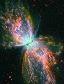 NGC  nebula has an estimated surface temperature of about  degrees C and its wingspan covers over  lightyears This sharp and colorful close-up of the dying stars nebula was recorded in  by the Hubble Space Telescopes Wide Field Camera 
