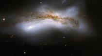 NGC  - The product of a collision between two disc galaxies that started  million years ago 