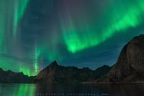 Northern lights over Reine Lofoten Islands Norway 