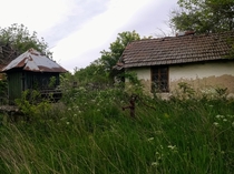 Old abandoned house with old well 