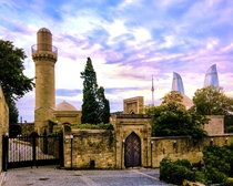 Old Baku city Azeirbaijan with the modern Flame towers in the background 