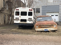 Old bus and pickup truck Sioux City IA