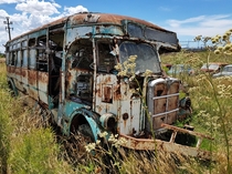 Old bus next to a highway somewhere in Argentina