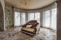 Old piano in the living room of a luxury villa