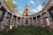 Old rotunda with columns without a dome on the bell tower  
