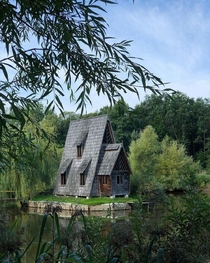 Old wooden house in a forest Ukraine the forest next to Zbrui village 
